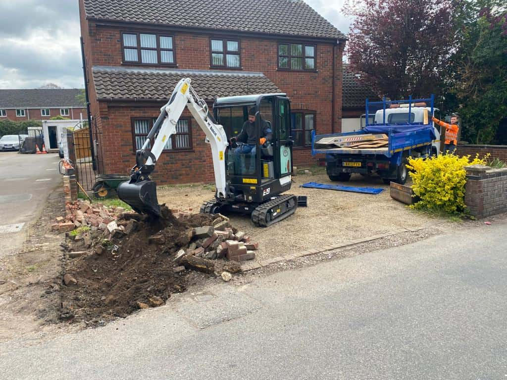 This is a photo of an operative of Lowestoft Driveway Solutions Digging out for a new tarmac driveway